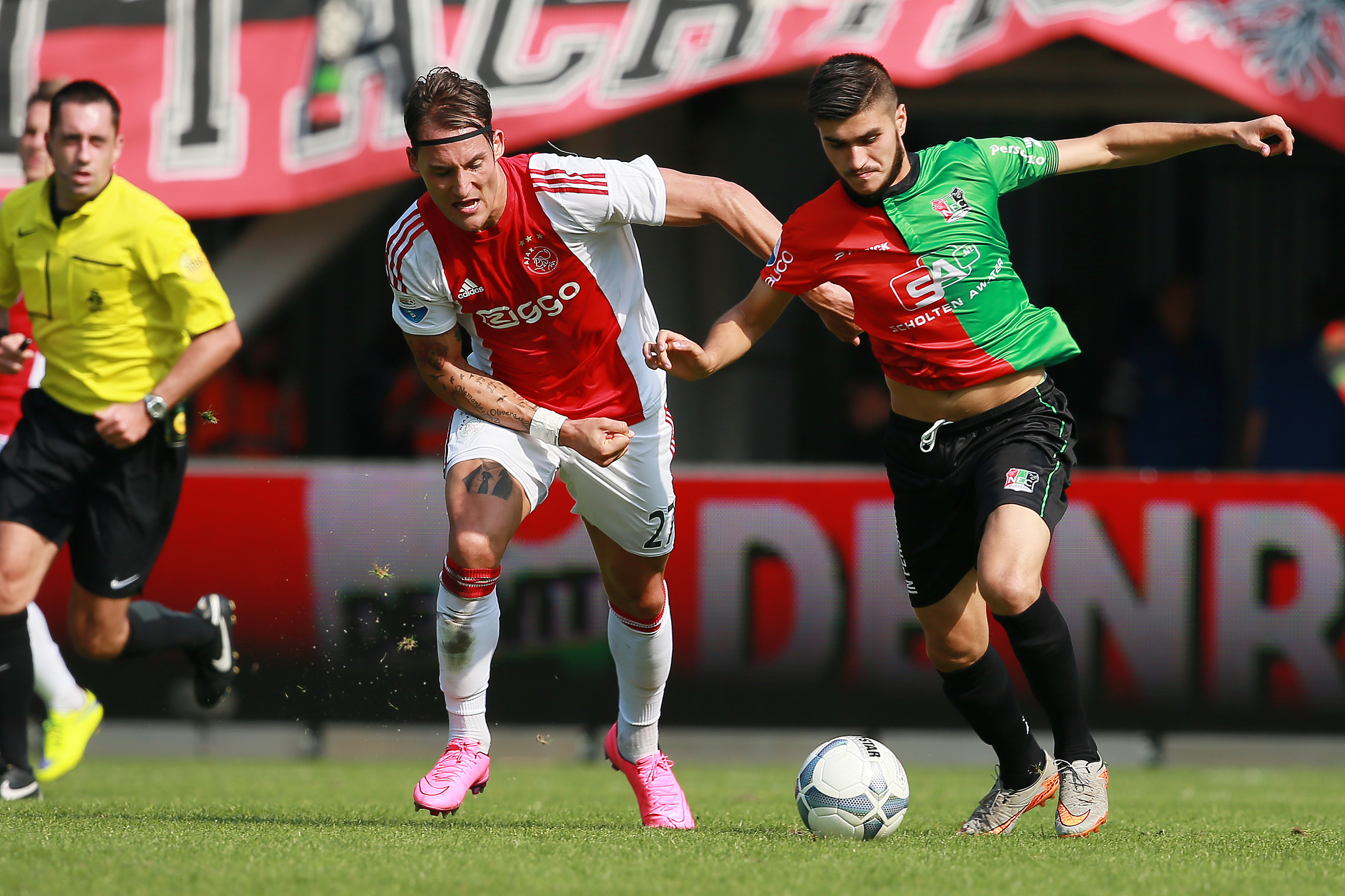 Nemanja Gudlj of Ajax Chihat Celik of NEC